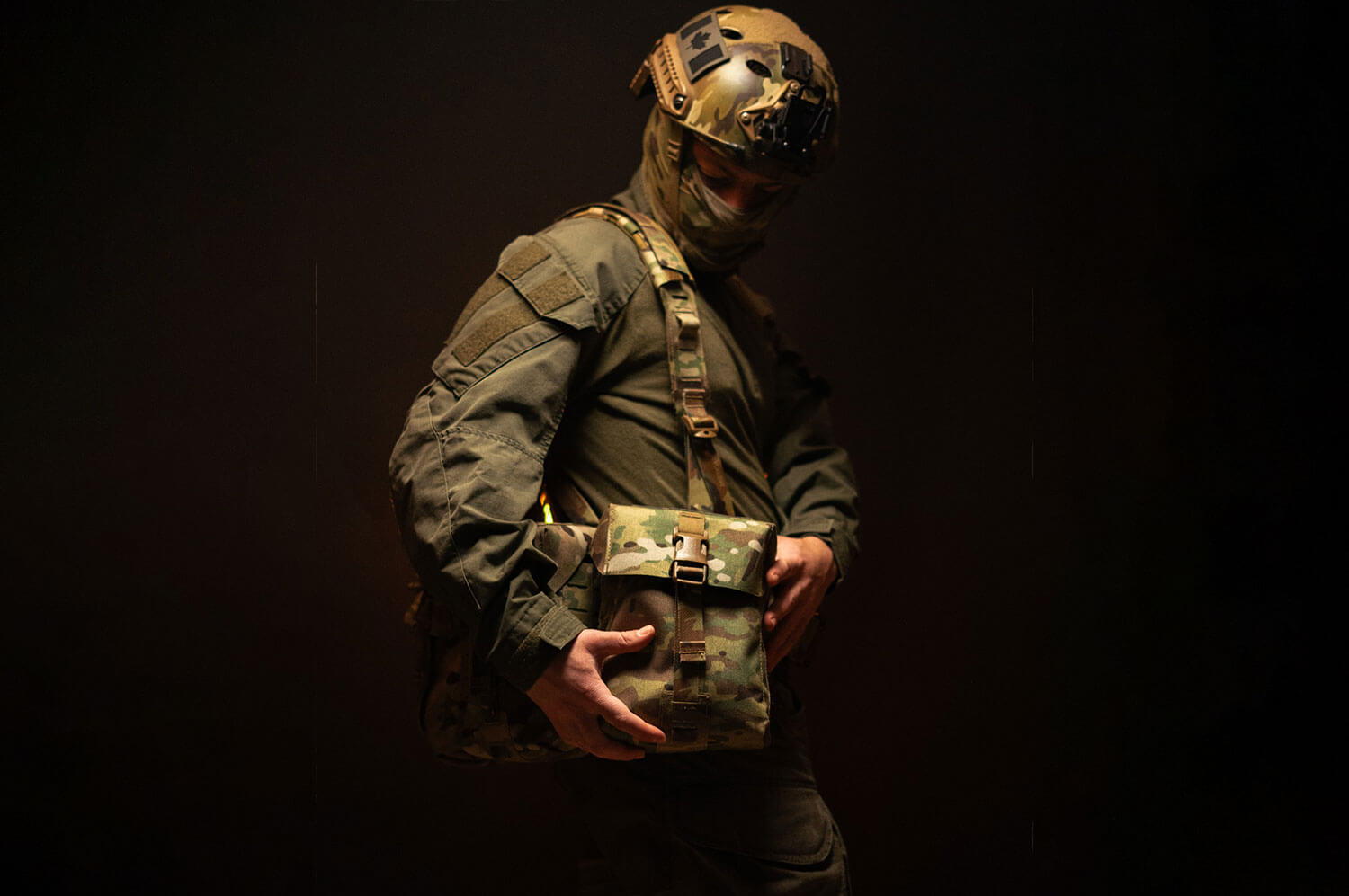 Soldier showcasing a tactical pouch